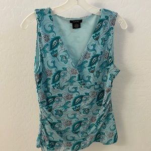 Sleeveless V neck large top with rouching